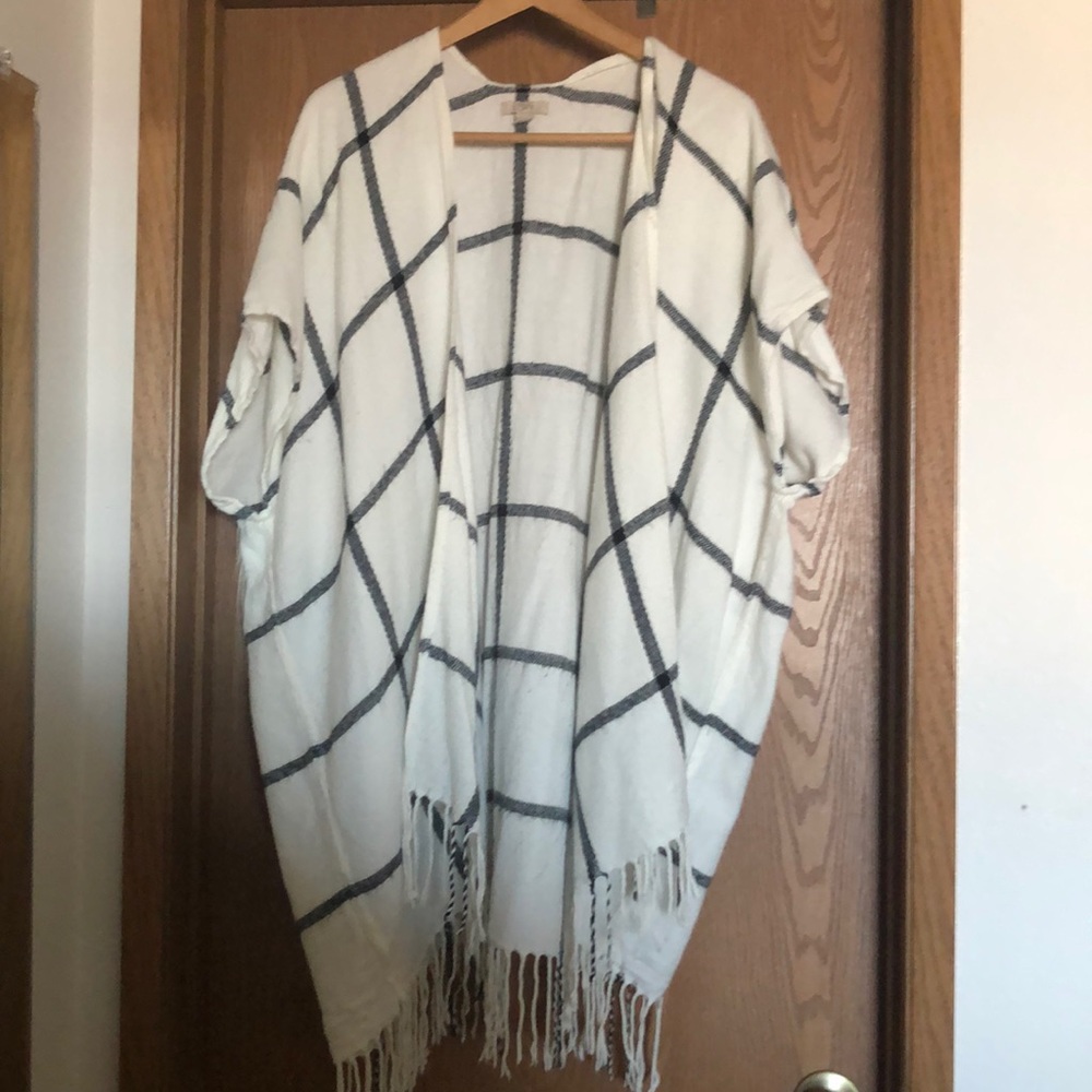 Cream and black poncho